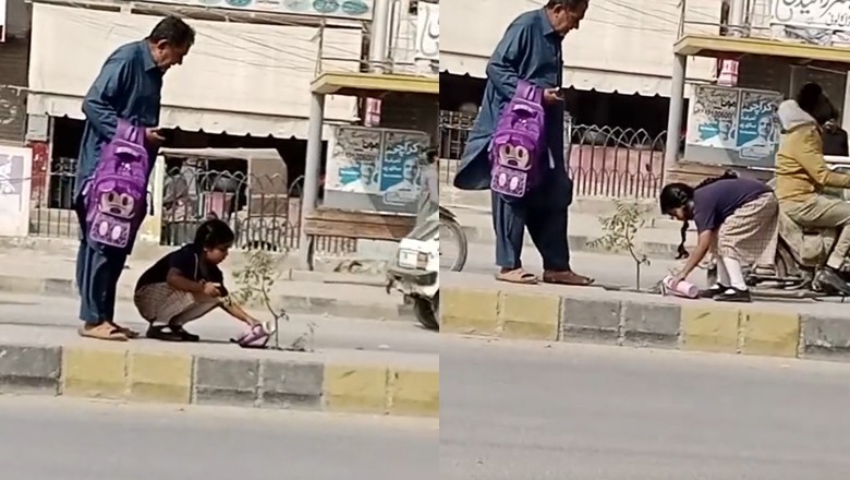 Little school girl watering plant from her flask melts hearts online