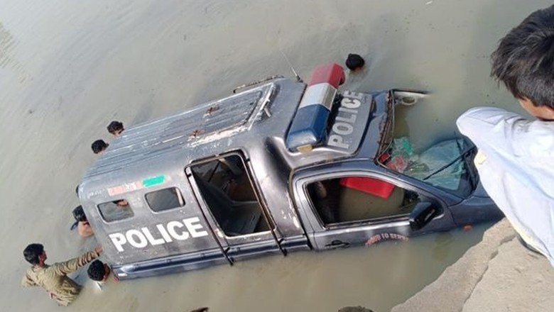 Speeding police van plunges into canal while patrolling in Dadu
