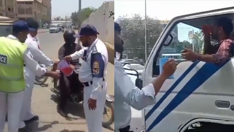 Traffic cops win hearts by offering juice, water to Karachiites amid heatwave