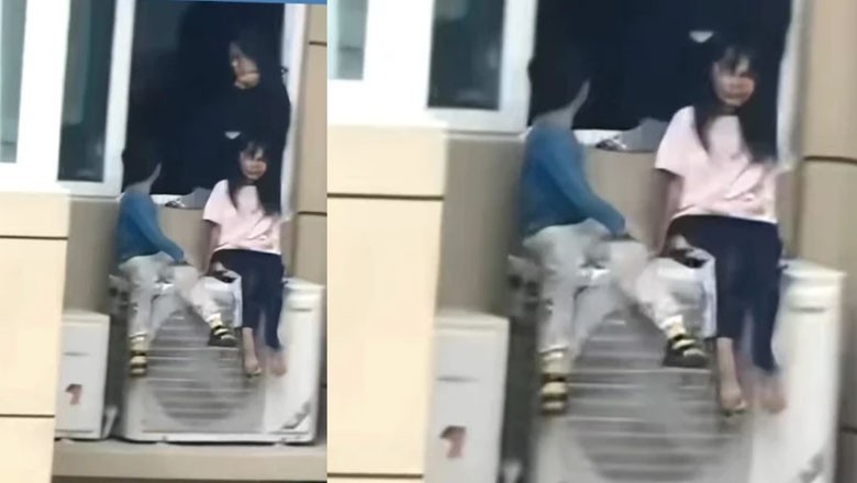 Children forced to sit on 23rd floor's AC unit after quarrel between parents