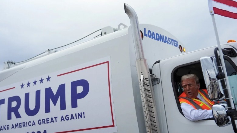 Trump drives dump truck after Biden calls his supporters “garbage”