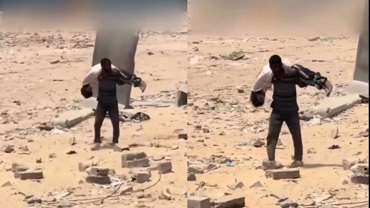 Father carries son killed by Israeli gunfire while waiting for aid in Gaza