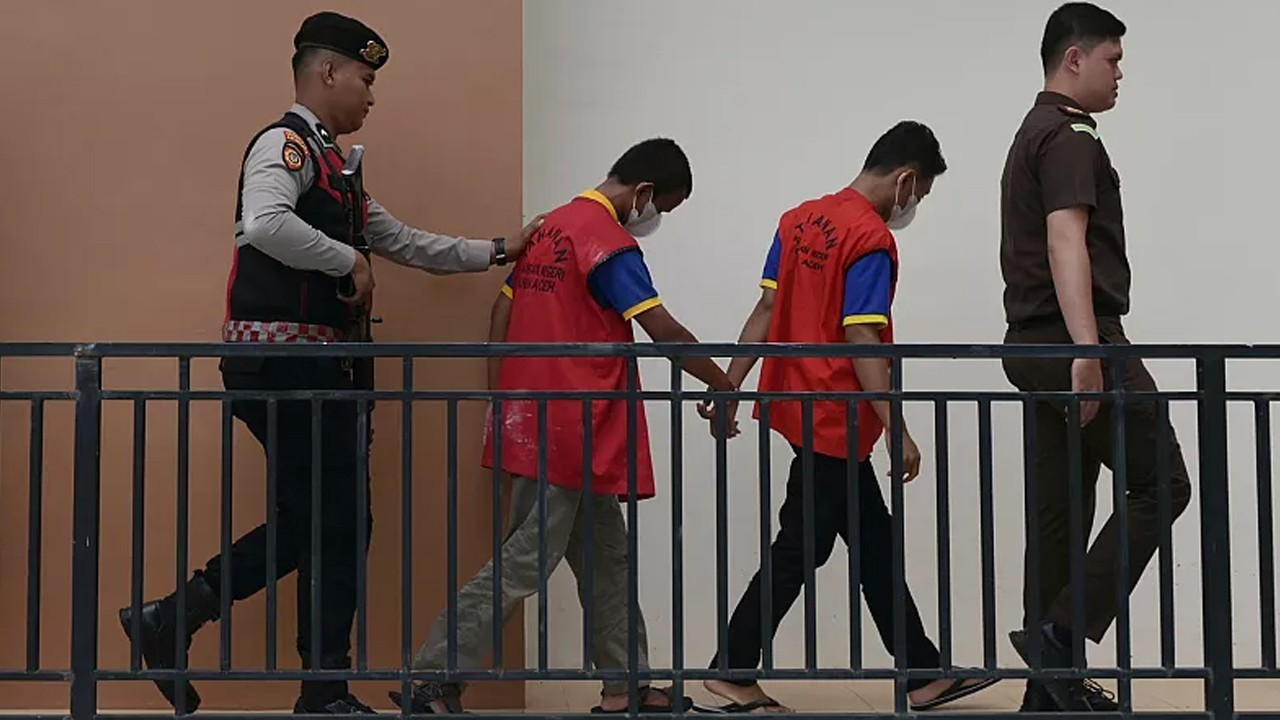 Two men receive public caning for engaging in sexual acts in Indonesia